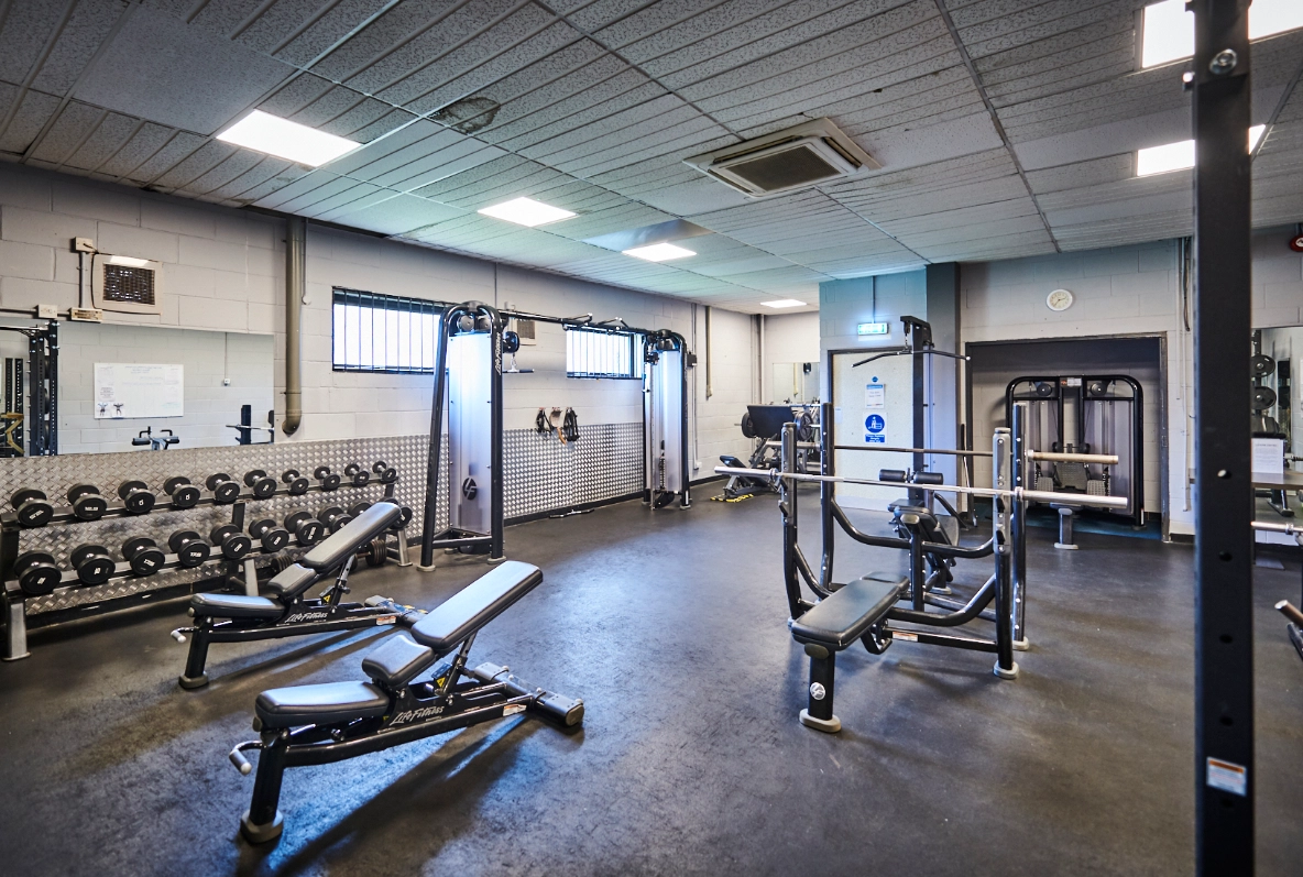 Scotch Horn Leisure Centre Gym showing a range of benches and weights and other equipment